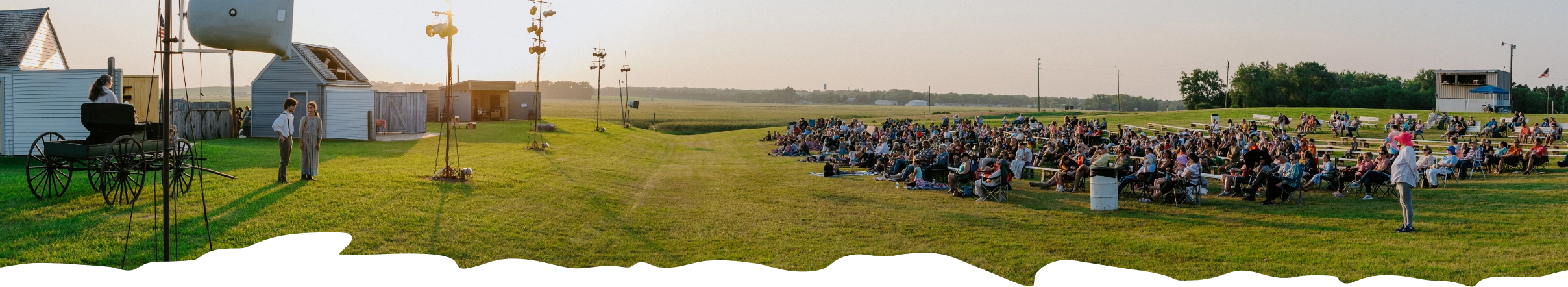 Crowd looking towards Laura Ingalls Wilder pageant.