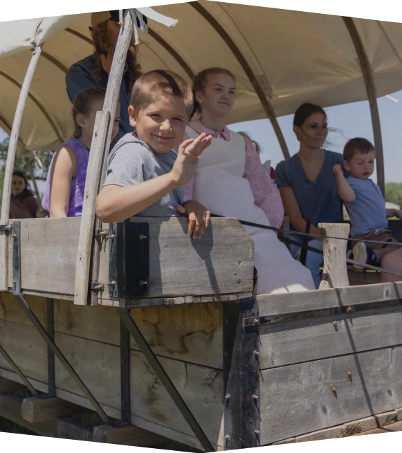kids riding in wagon