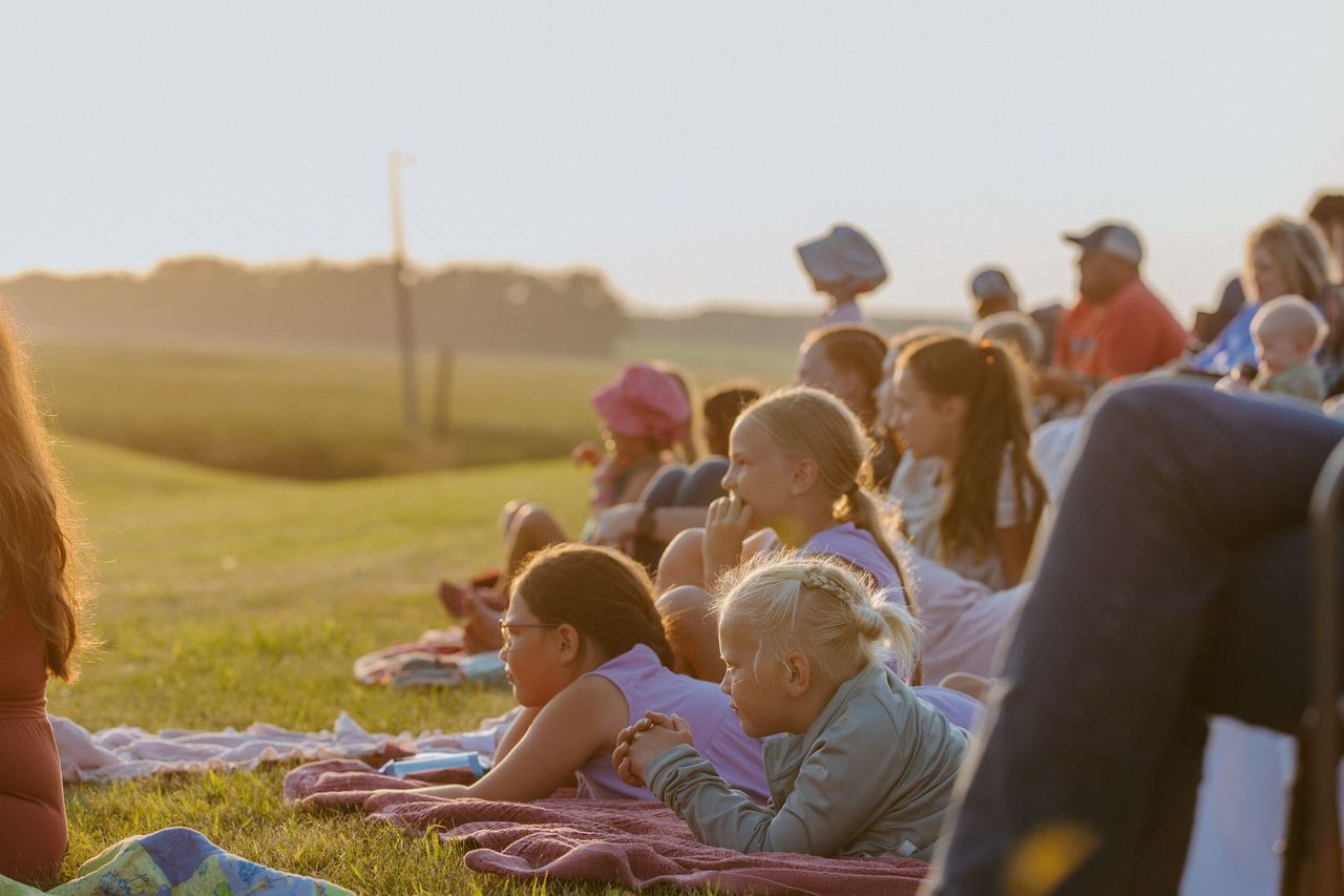 Crowd watching the prairie theater.